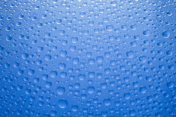 Água Cai Fundo Azul Gotas Água Fundo Vidro — Fotografia de Stock