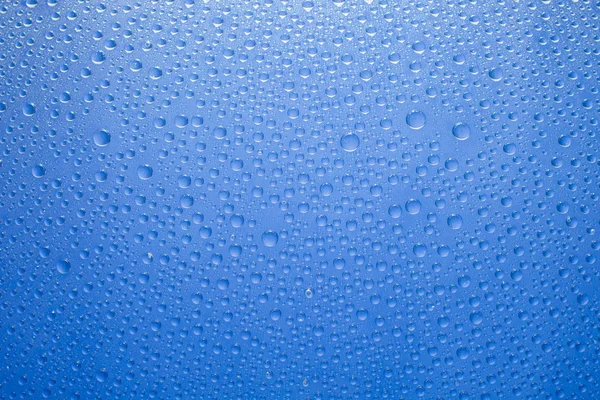 Água Cai Fundo Azul Gotas Água Fundo Vidro — Fotografia de Stock