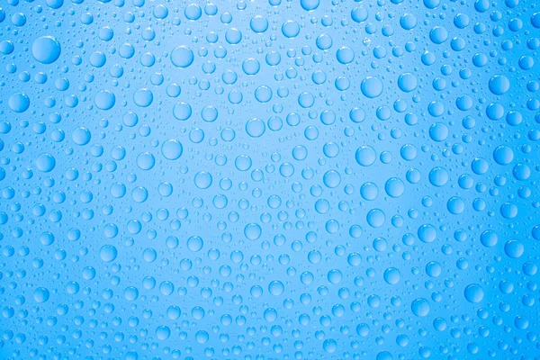 Waterdruppels Blauwe Achtergrond — Stockfoto