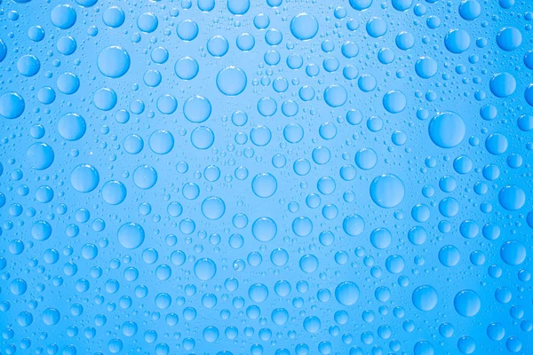 Waterdruppels Blauwe Achtergrond — Stockfoto