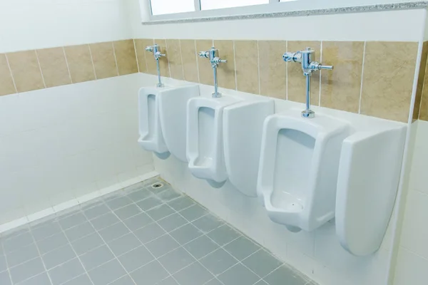 Row Urinals Men Public Toilet Closeup White Urinals Men Bathroom Royalty Free Stock Photos