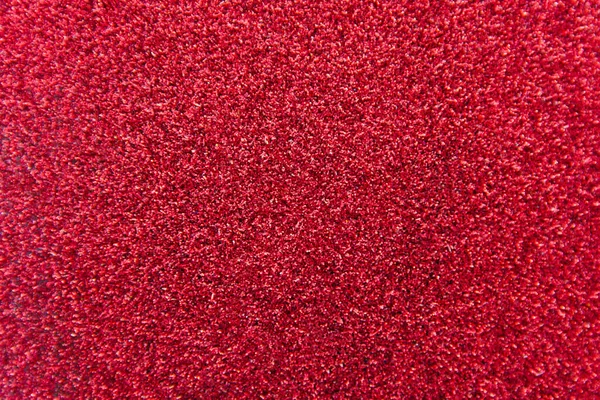Red glitter texture background. Red christmas abstract background