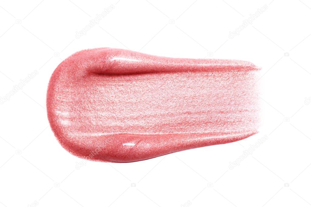 Lip gloss smear isolated on white. Smudged makeup product sample