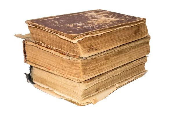 A stack of old tattered books. Vintage torn books. Antiques isolated. — Stock Photo, Image