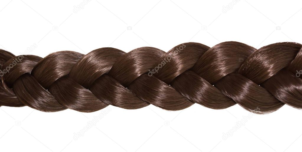 Womens hair isolated on white background. A brown braid of hair.