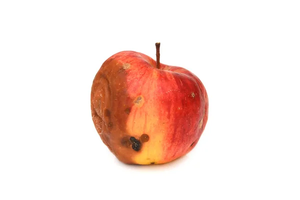 Червоне гниле яблуко. Натуральний колір і текстура — стокове фото