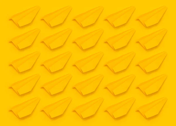 Pattern of yellow origami planes on a yellow background.