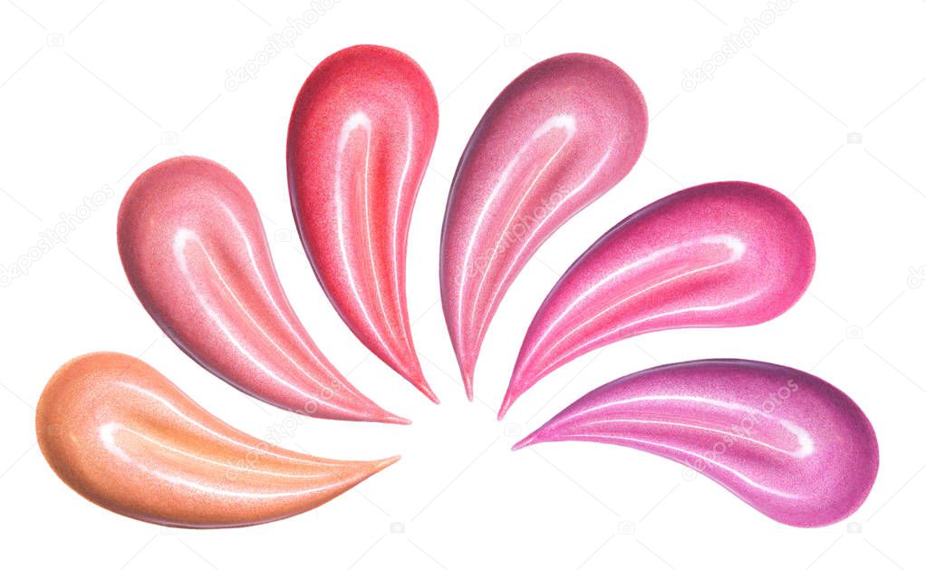 Set of different colors lip glosses smear isolated on white. Makeup sample