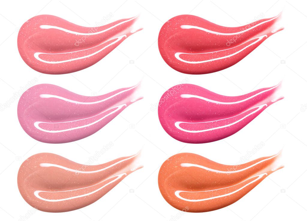 Set of different lip glosses pastel color smear samples isolated on white