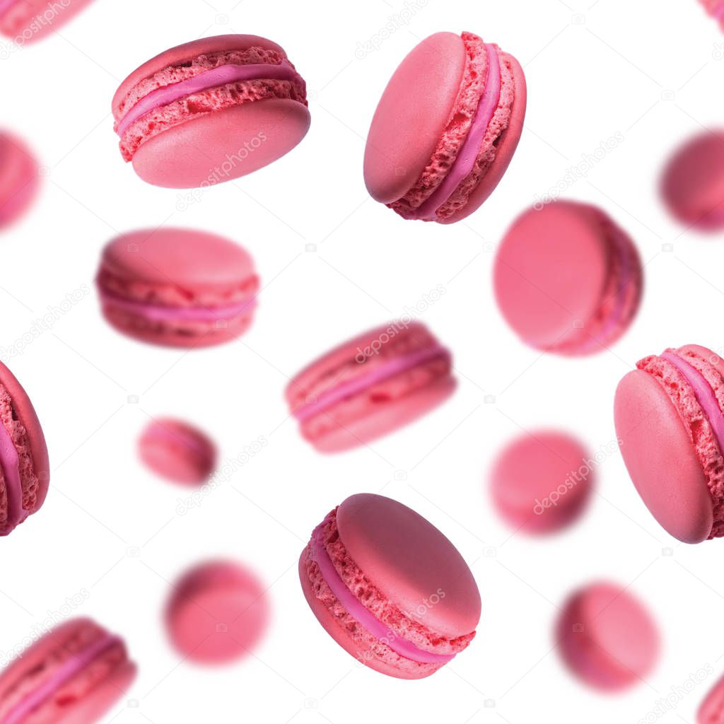 Seamless pattern with falling pink french macaroons cakes isolated on white background. Flying dessert