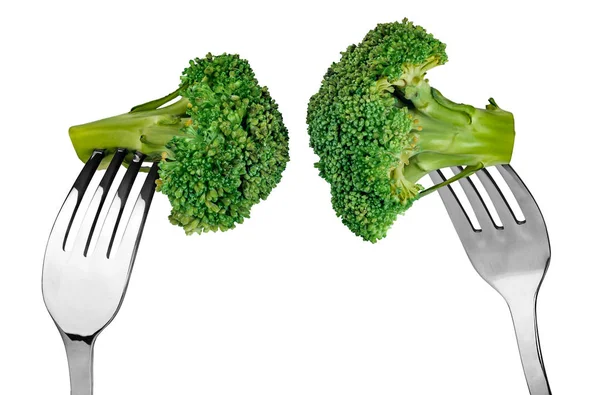 Broccoli on forks — Stock Photo, Image