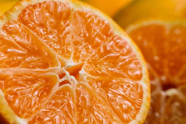 Slices of mandarin, orange, grapefruit and lemon very close-up, macro