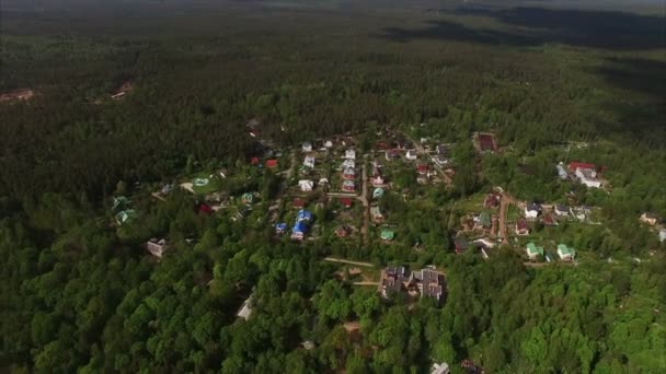 4k aerial shot of cottages near sea — Stock Footage 4k aerial shot of cottages near sea Stock Video