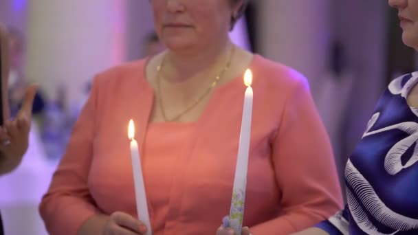 Two women with candles — Stock Video
