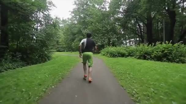 Man jogging in park — Stock Video