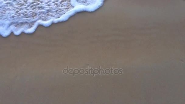 Waves surf on a beach at the evening — Stock Video