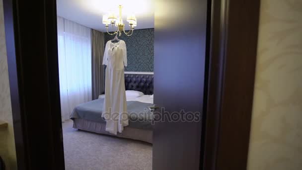 Wedding dress in bedroom — Stock Video