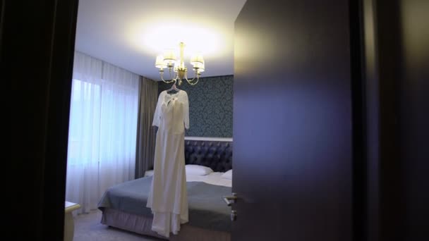 Wedding dress in bedroom — Stock Video