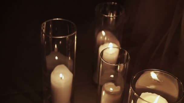 Candles in glasses — Stockvideo