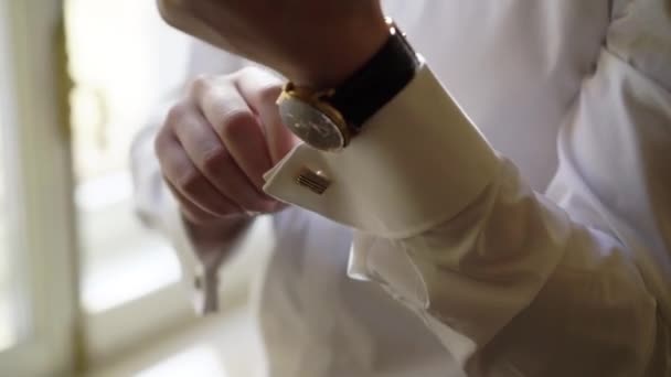 Man put on wrist watches — Stock Video