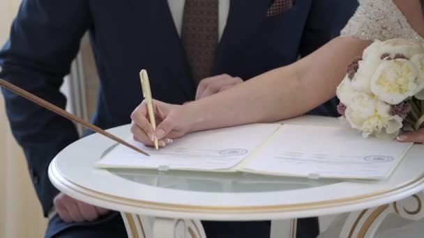 Bride signing documents — Stock Video
