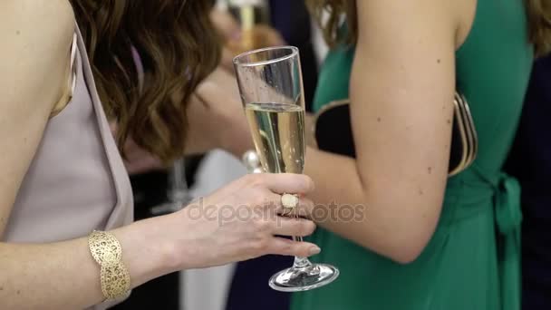 Young woman with glass of champagne — Stock Video