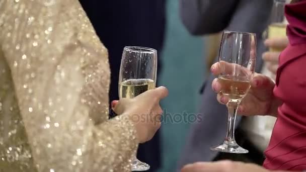 Young woman with glass of champagne — Stock Video