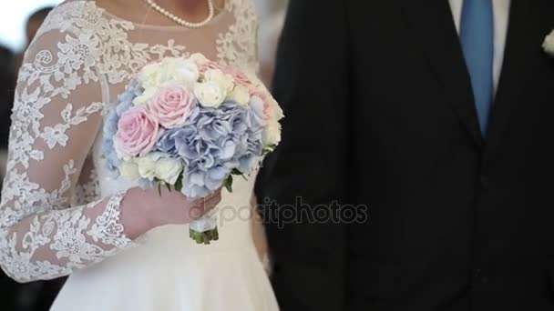 Bride and groom holding hands — Stock Video