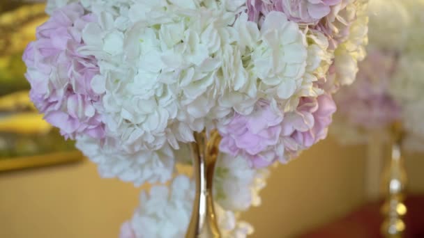 Table with fruits decorated with flowers — Stock Video