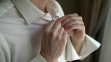 Gömlek uzun kol kadar düğmelerini