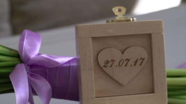 Wedding rings in wood box — Stok Video