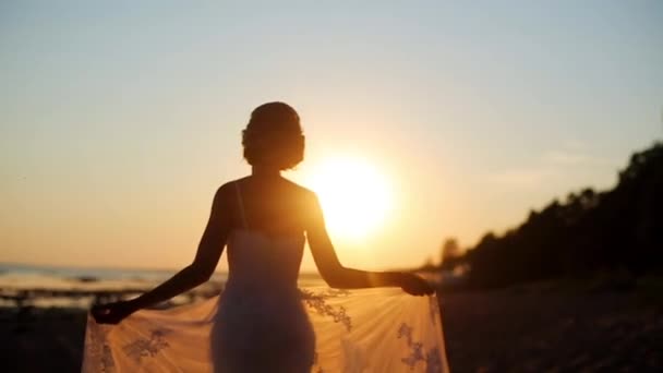 Bride walking at sunset — Stock Video