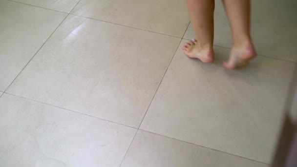 Woman going naked in shower — Stock Video