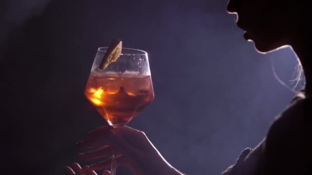 Young woman with glass of cocktail — Stock Video