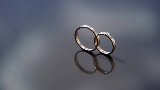 Wedding rings. Pair of marriage symbols. Love of bride and groom becoming wife and husband. Matrimony symbol. — Stock Video