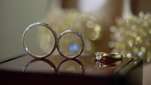 Wedding rings. Pair of marriage symbols. Love of bride and groom becoming wife and husband. Matrimony symbol. — Stock Video