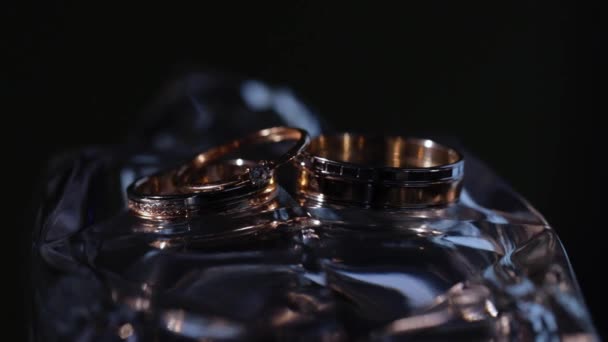 Wedding rings. Pair of marriage symbols. Love of bride and groom becoming wife and husband. Matrimony symbol. — Stock Video