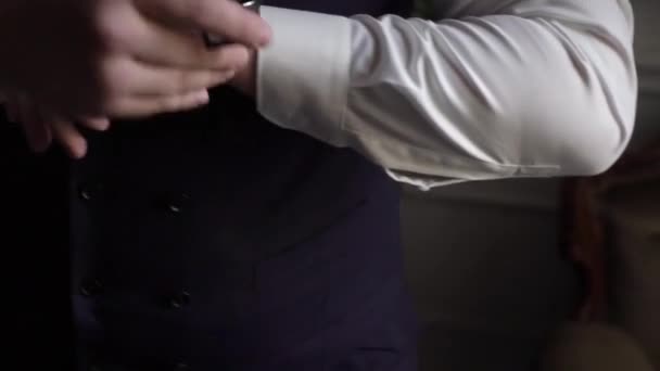 Businessman put on wrist watch. Young man or groom dressing — Stock Video