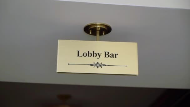 Lobby bar in hotel sign — Stock Video