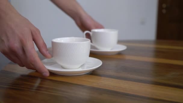 Young man drinking tea from cup in the morning. Breakfast at home — Stock Video