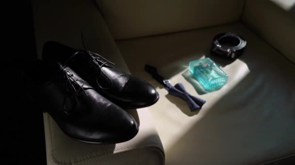 Mans accessories - shoes, bowtie, belt and parfume. Groom fashion for wedding. — ストック動画