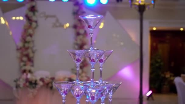 Pyramid tower of glasses for champagne at the party — Stock Video