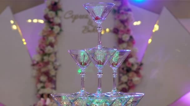 Pyramid tower of glasses for champagne at the party — Stock Video