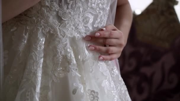 Bride getting ready in the morning. Preparation before wedding ceremony, put on dress — Stock Video