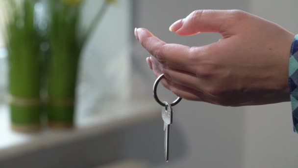 Key from new apartment house. Moving to flat relocation, homeowner — Stock Video