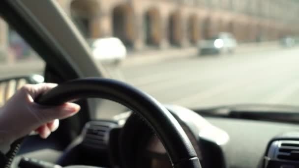 Young woman driving car in protective gloves. Pandemic of coronavirus covid-19. — Stock Video