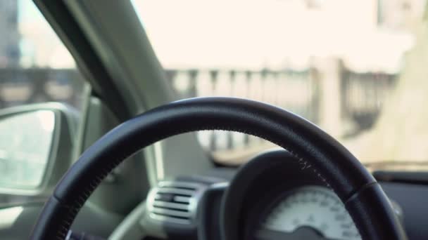 Young woman driving car in protective gloves. Pandemic of coronavirus covid-19. — Stock Video