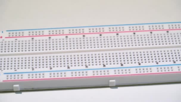 Breadboard electronics equipment mockup plate. DIY project arduino programming — Stock Video