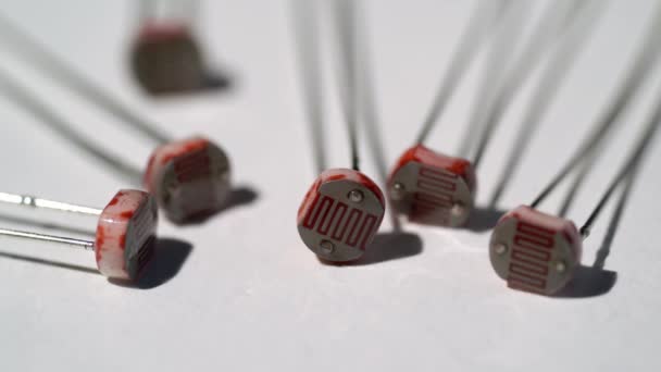 Photoresistor for detecting light. Electronics components for diy engineering — Stock Video