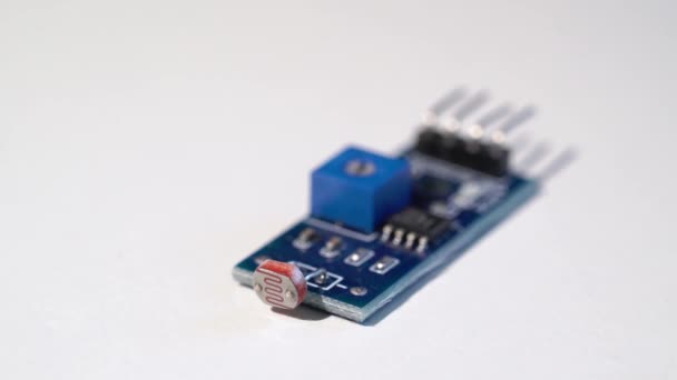 Photoresistor for detecting light. Electronics components for diy engineering — Stock Video